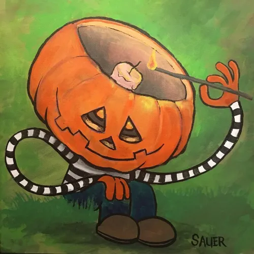 A figure with very long skinny arms sitting in the grass lighting a candle inside his over-sized jack-o-lantern head.